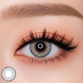 EOS Fairy Gray colored contact lens worn on eye — natural gray tone, FDA 510(k) cleared