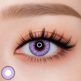 EOS Fairy Violet colored contact lens worn on eye — natural purple tone, FDA 510(k) cleared