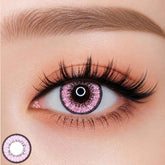 EOS New Adult Pink colored contact lens worn on eye â bold pink tone, FDA 510(k) cleared