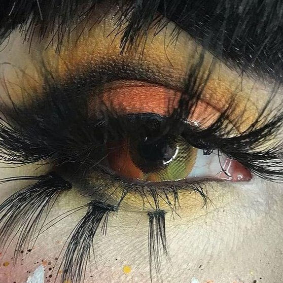 kazzue coscon anime orange colored contact lens close-up