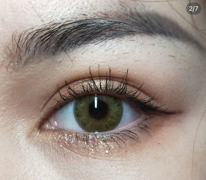 kazzue jewel olive colored contact lens closeup