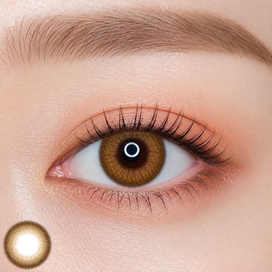 EOS Coco Brown colored contact lens worn on eye — natural brown tone, FDA 510(k) cleared
